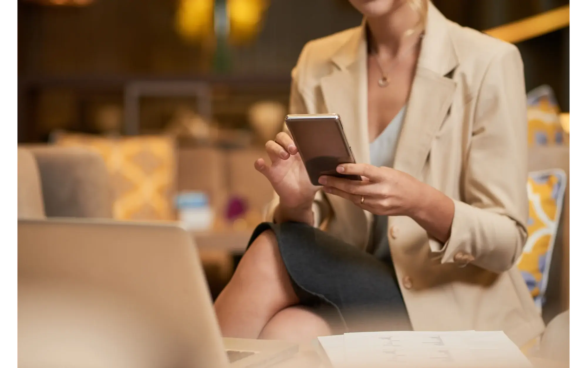 An advisor reviewing her profile on a phone